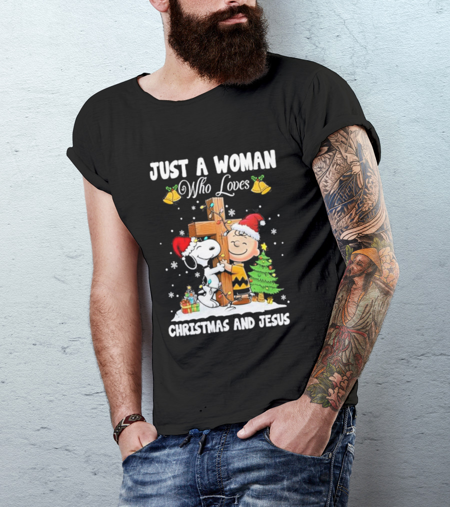 Snoopy Just A Woman Who Loves Christmas And Jesus 2024 Charlie Brown Hugging Cross Santa Hats Snowflakes T-Shirt