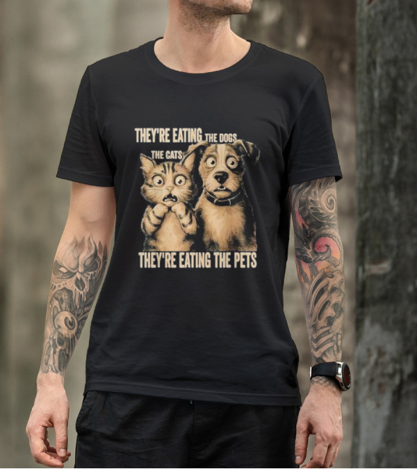 THEY'RE EATING THE DOGS THE CATS THEY'RE EATING THE PETS T-Shirt