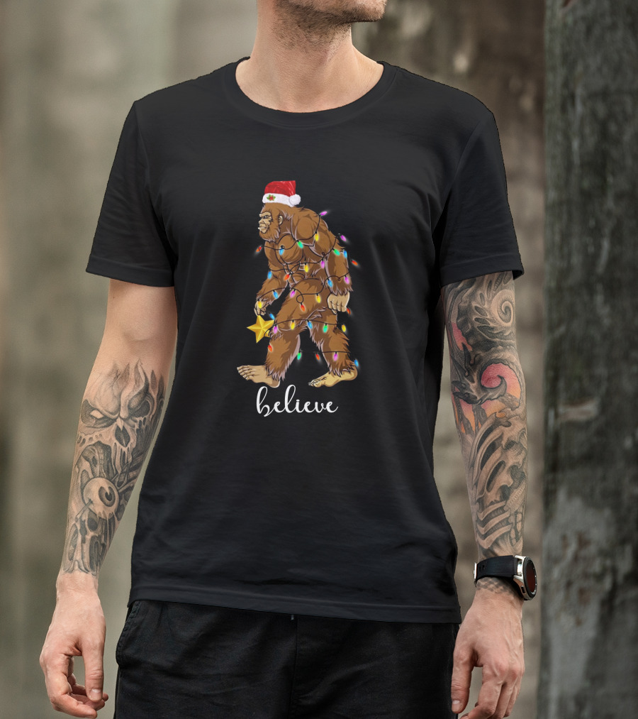 Bigfoot Christmas Lights Believe With Santa Hat And Star T-Shirt