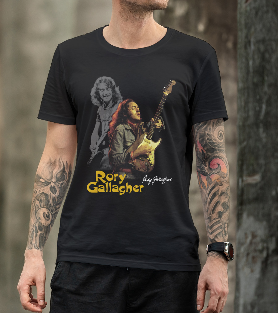 Rory Gallagher Playing Electric Guitar With Signature T-Shirt