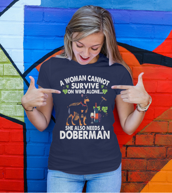 A Woman Cannot Survive On Wine Alone She Also Needs A Doberman T-Shirt