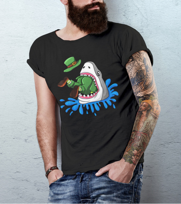 Shark Devours Leprechaun Wearing Green Outfit With Dropped Hat In Water Splash T-Shirt