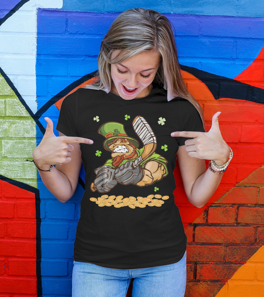 Leprechaun Swinging Hockey Stick Surrounded By Shamrocks And Gold Coins T-Shirt