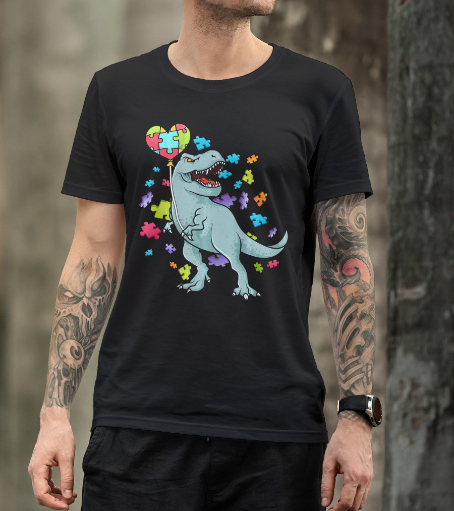 Autism Awareness Dinosaur With Puzzle Heart Balloon And Colorful Puzzle Pieces T-Shirt