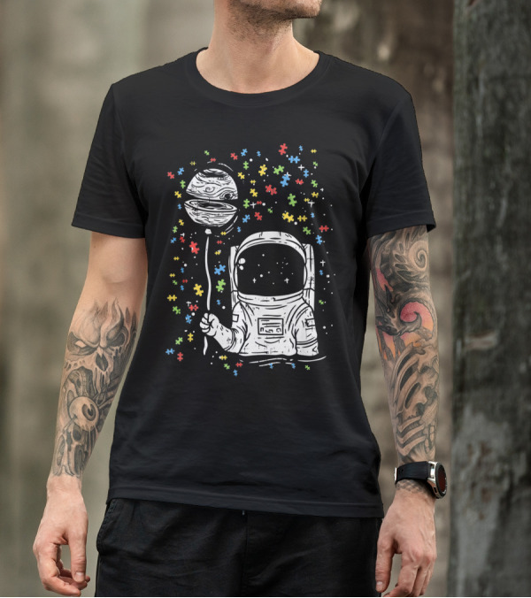 Astronaut Holding Planet Balloon With Puzzle Pieces For Autism Awareness T-Shirt