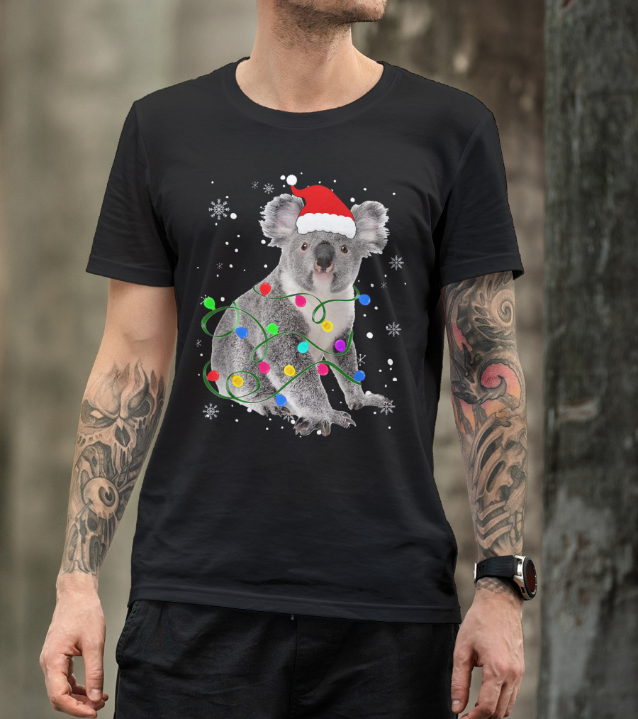 Koala Wrapped In Christmas Lights Wearing Santa Hat With Snowflakes Matching Fam T-Shirt