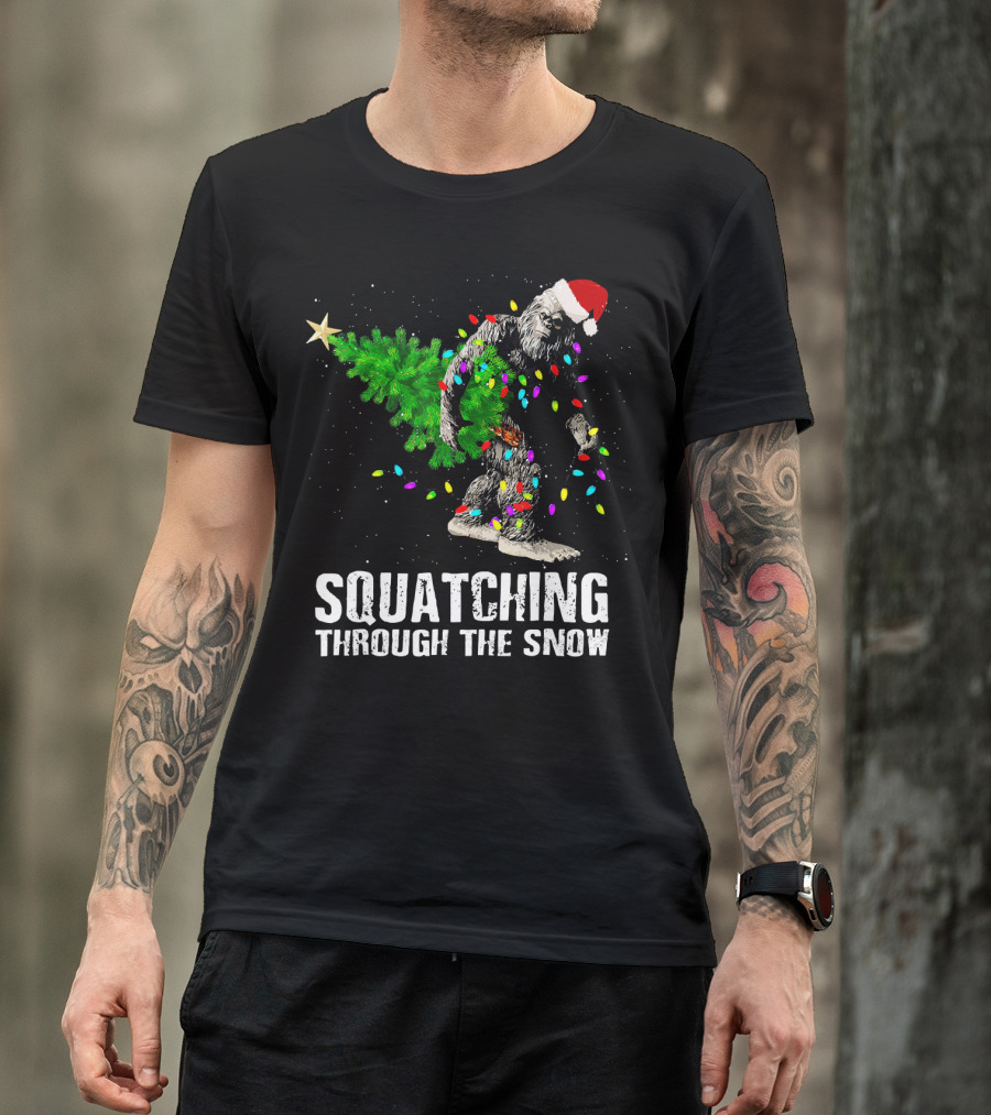 Squatching Through The Snow Bigfoot Christmas Lights Santa Hat T-Shirt