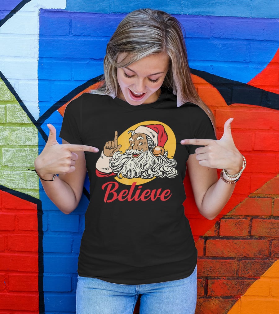 Black Santa Claus With Believe Caption And Yellow Background T-Shirt
